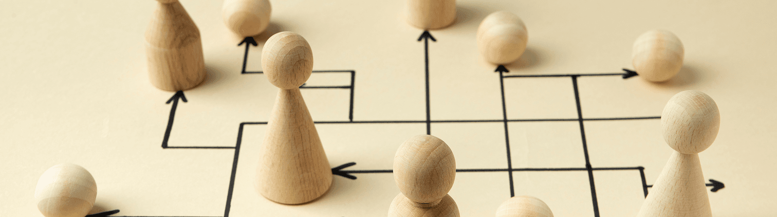 wooden people and arrows